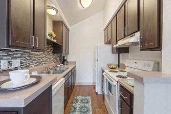 Fully furnished kitchen with stainless steel appliances